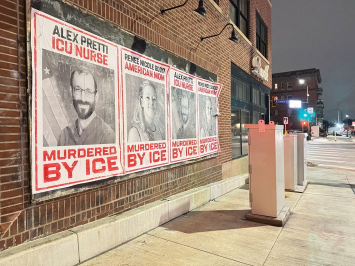 Wall with posters of Good and Pretti